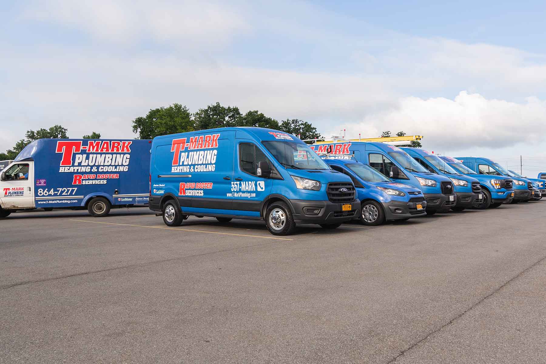 https://t-markplumbing.com/media/fleet-of-trucks.jpg